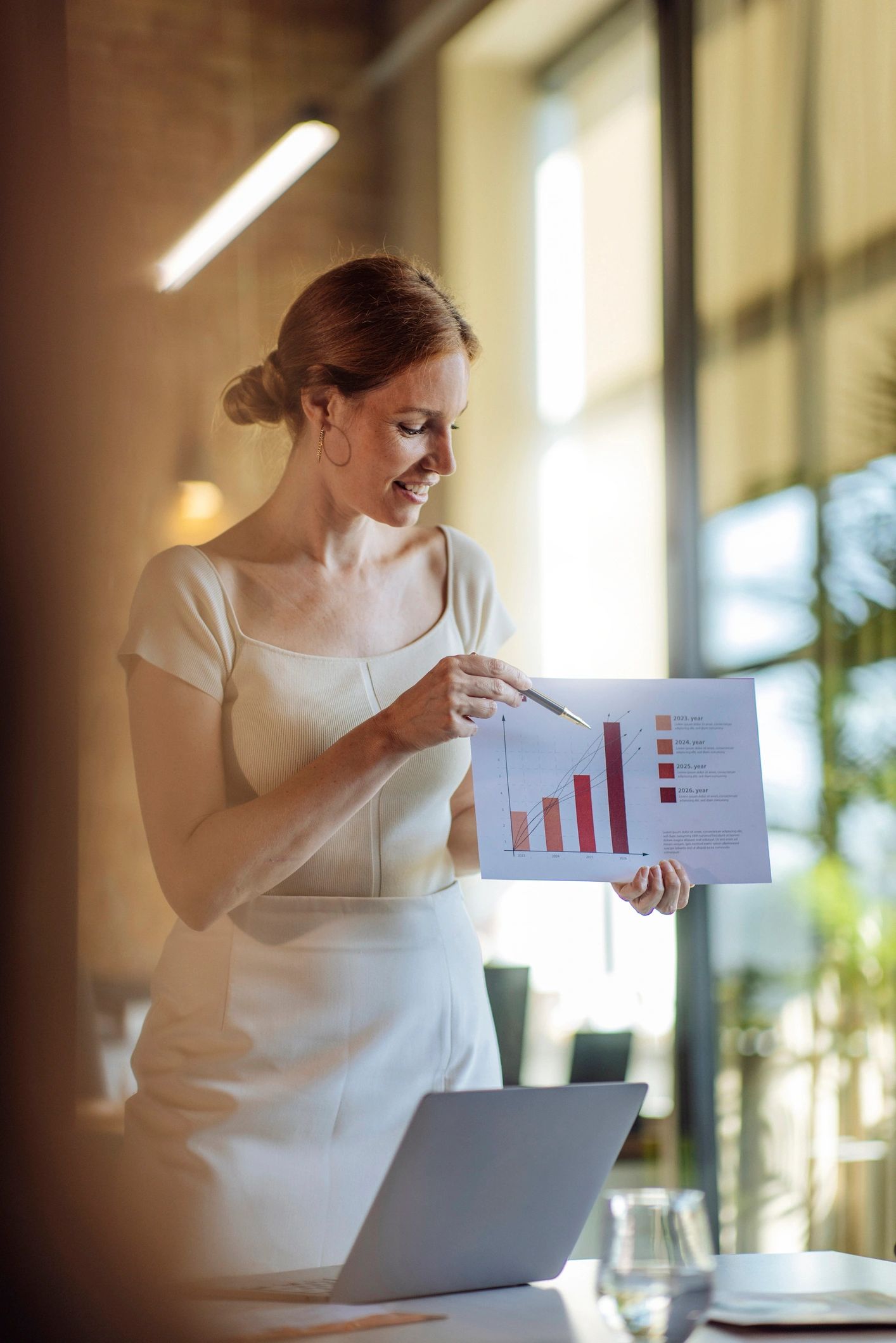 Businesswoman presenting a data report in an office